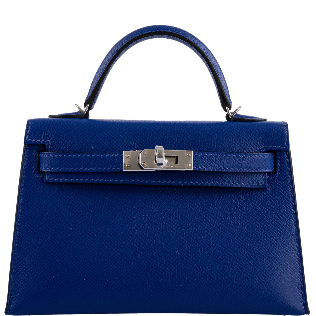 Blue handbag with a silver clasp on a white background