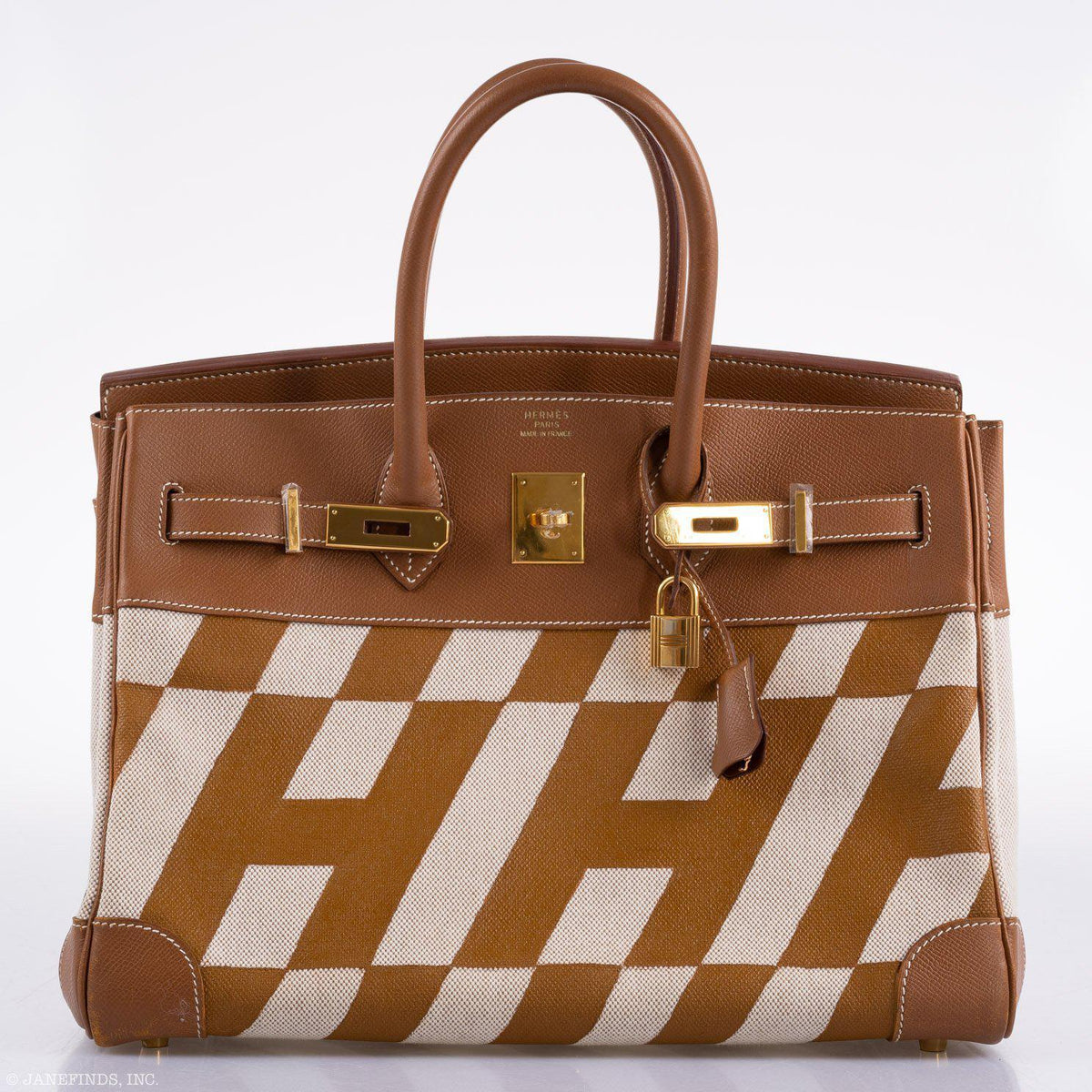 Gold hardware flap and toggle closure on Hermes Birkin 35