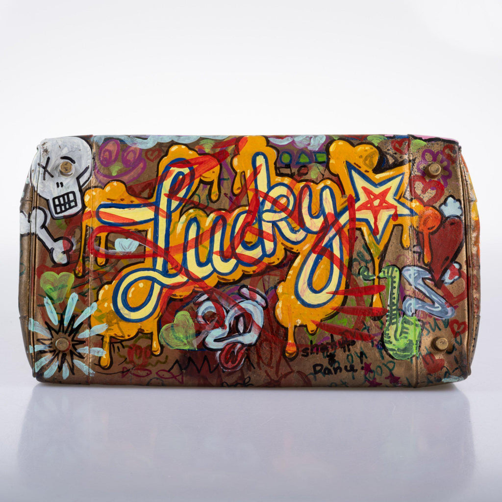Hermes lock and clochette with hand-painted accents