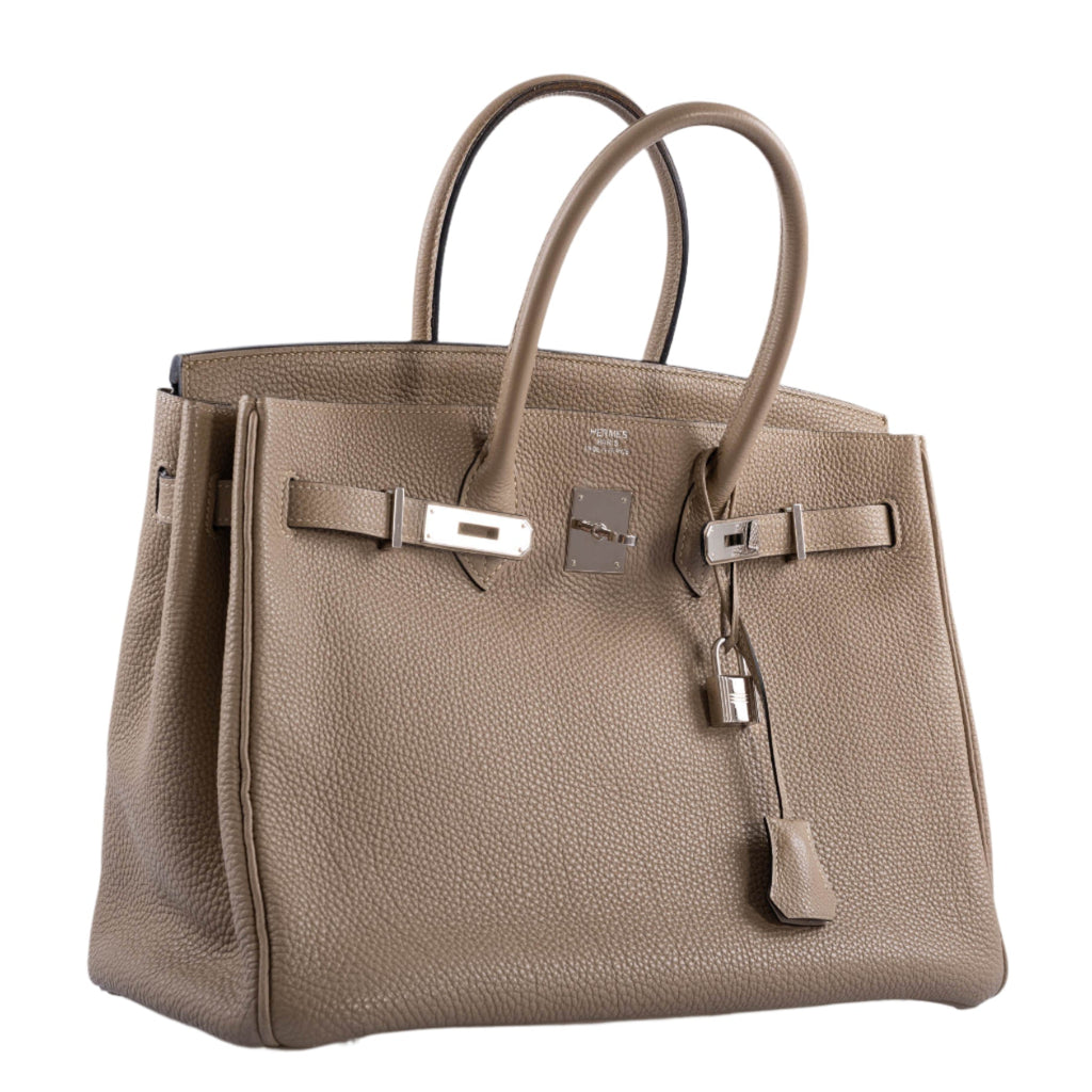 Rolled handles and lock detail of Hermes Birkin 35 Gris Togo