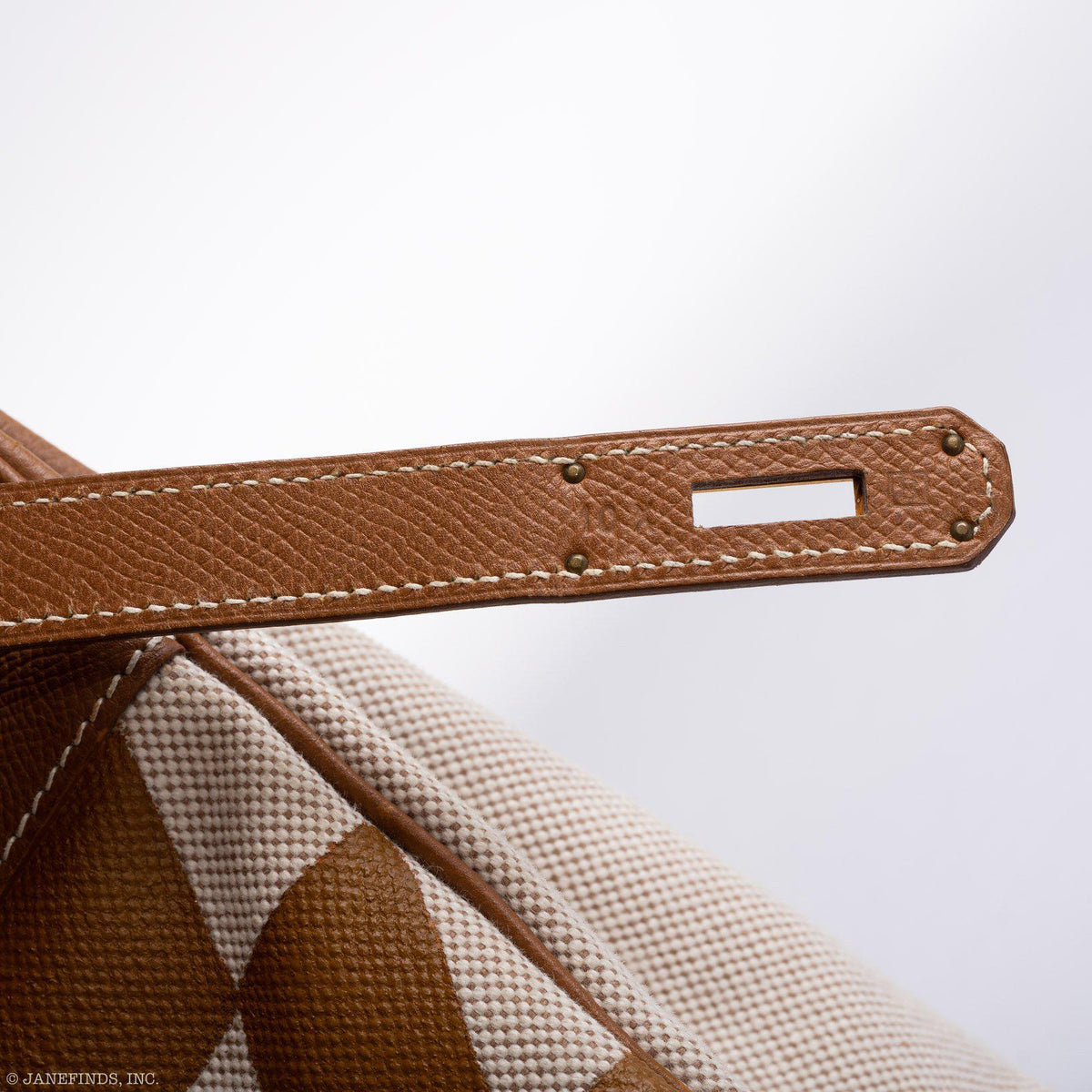 Close-up of the Ulysses H painted motif on Hermes Birkin 35 canvas panel