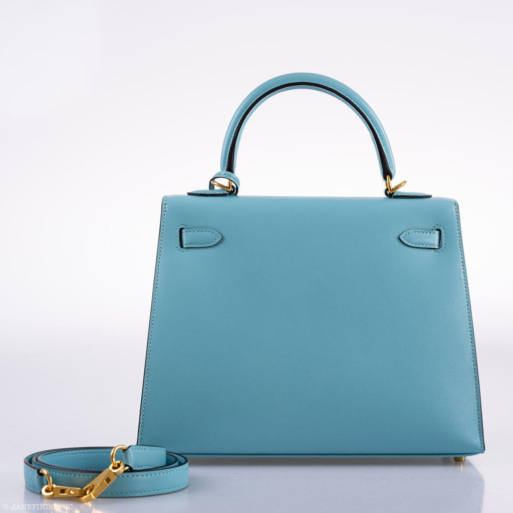 Front view of Hermes Kelly 25 in Blue Atoll Tadelakt leather with custom feather panel