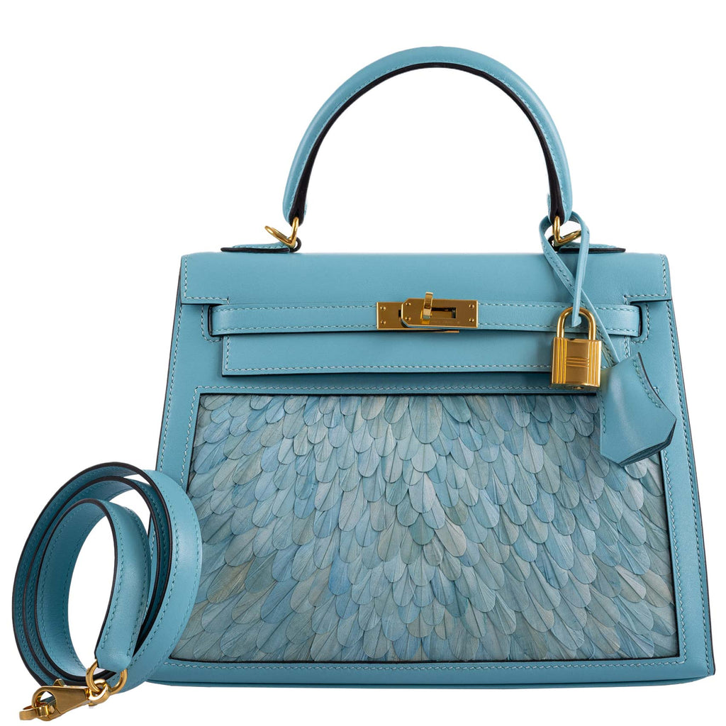 Side profile of Hermes Kelly 25 Blue Atoll bag showing clean Sellier silhouette
